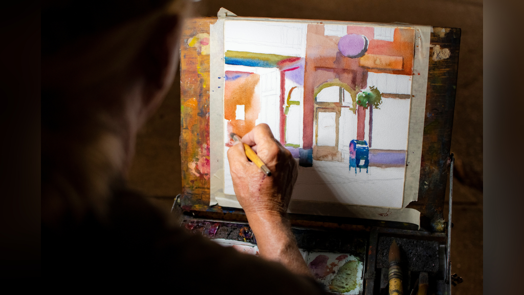 Watercolor artist Wyatt Waters working on a new painting.